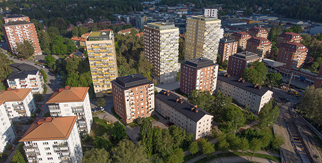 Visionsbild över bostadshuset, flygperspektiv.