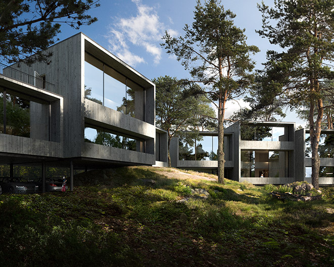 Hus i betong och glas som byggts i skogen och anpassats till naturens förutsättningar.